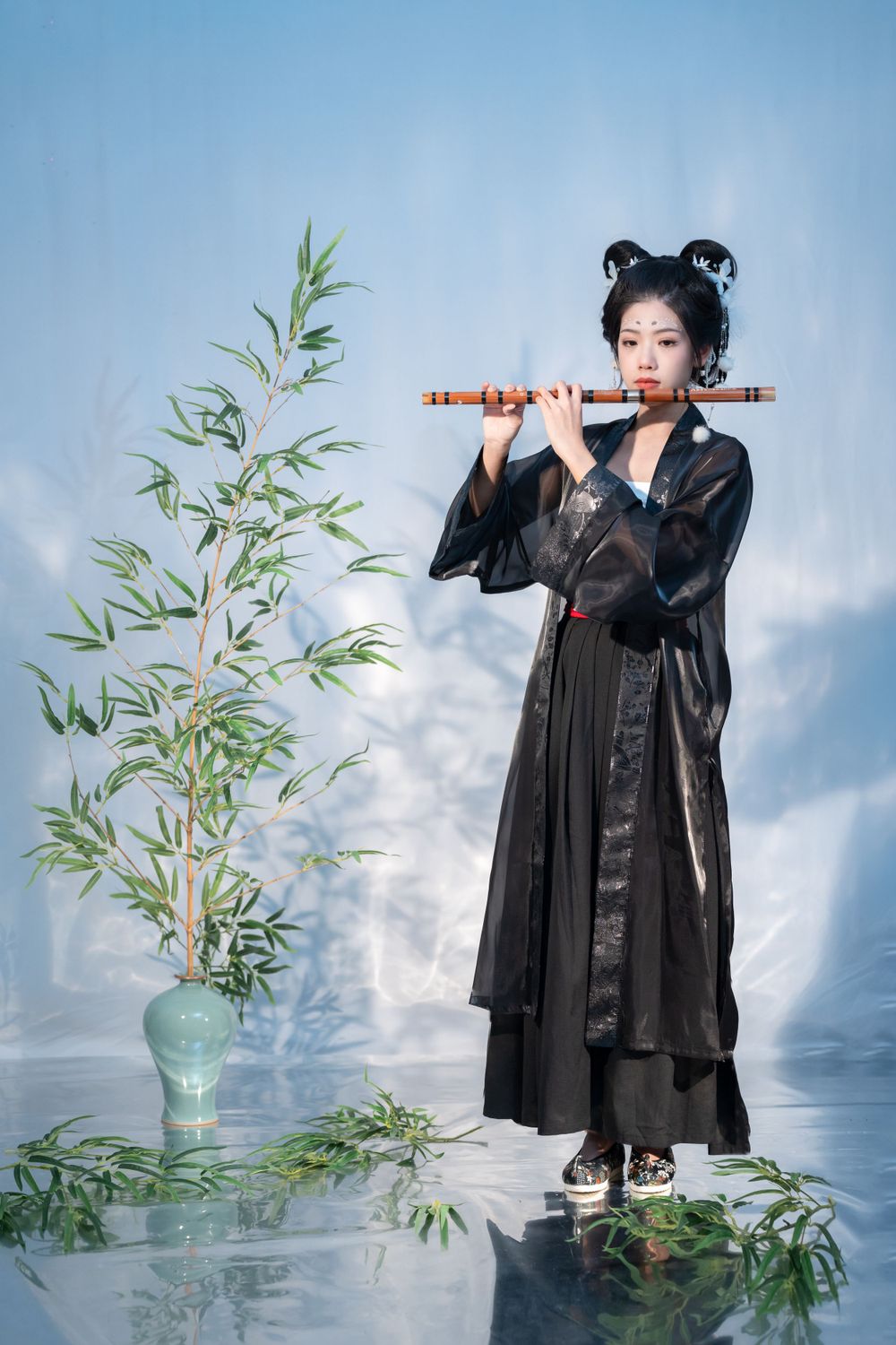 Emotional cinematic studio portrait in panda Hanfu cosplay among bamboo, smiling through tears, by Imagine Image Studio.
