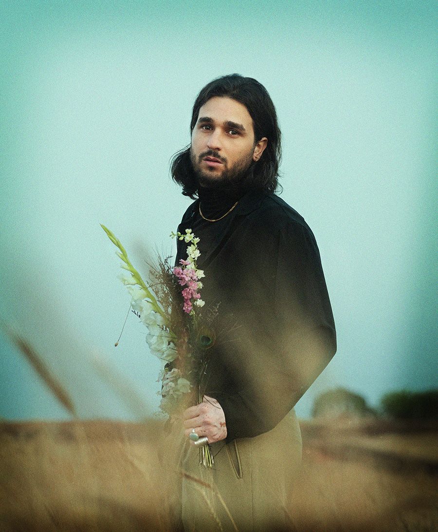 Portrait of a man in a field, Outdoor photography. Fashion photography. artist