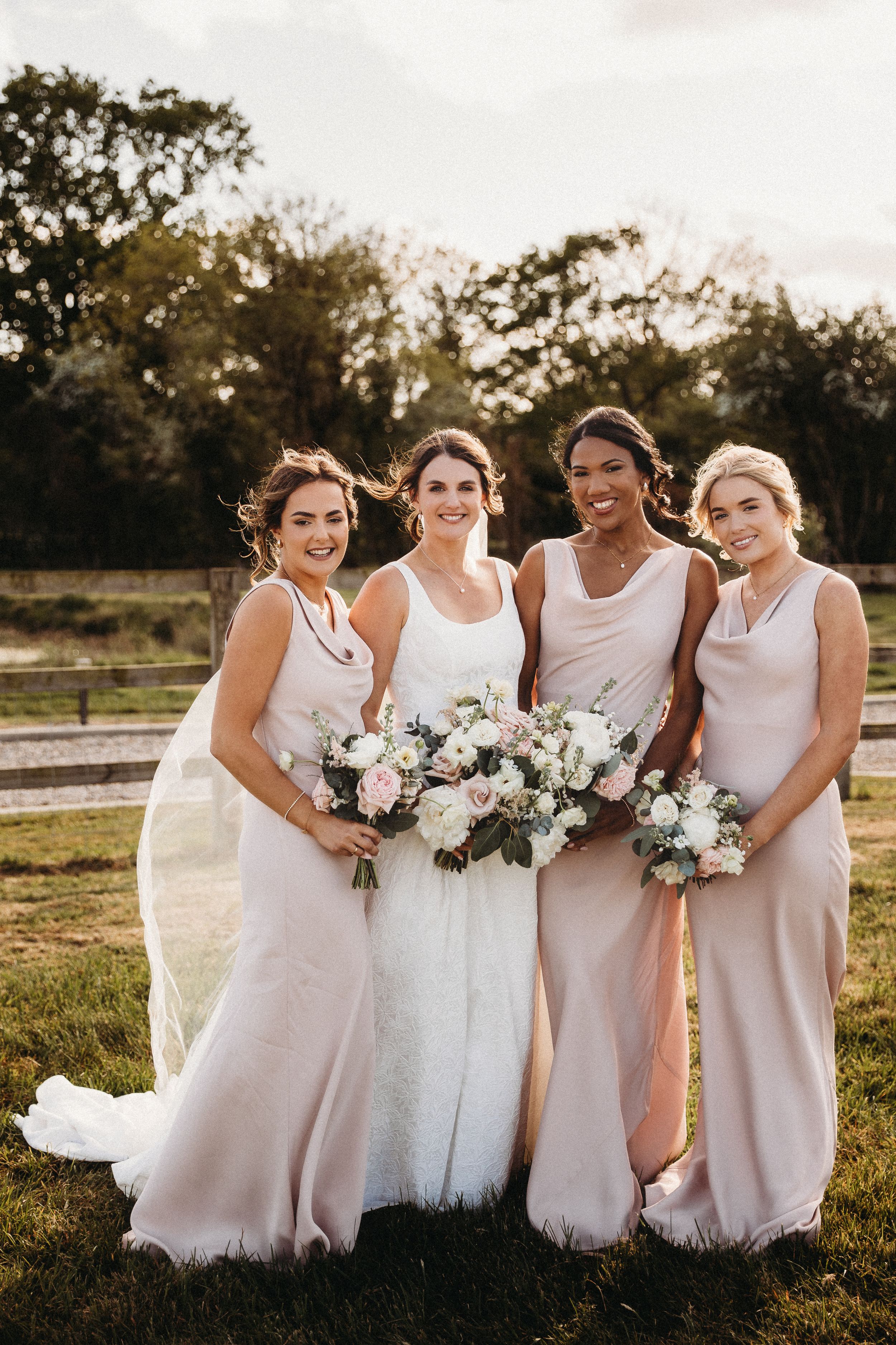 Golden hour group shot of Bridesmaids