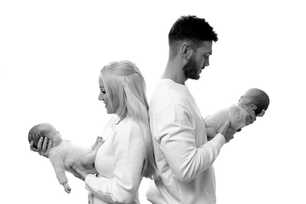 A sequence of people in white clothing gesturing and moving against a white background.
