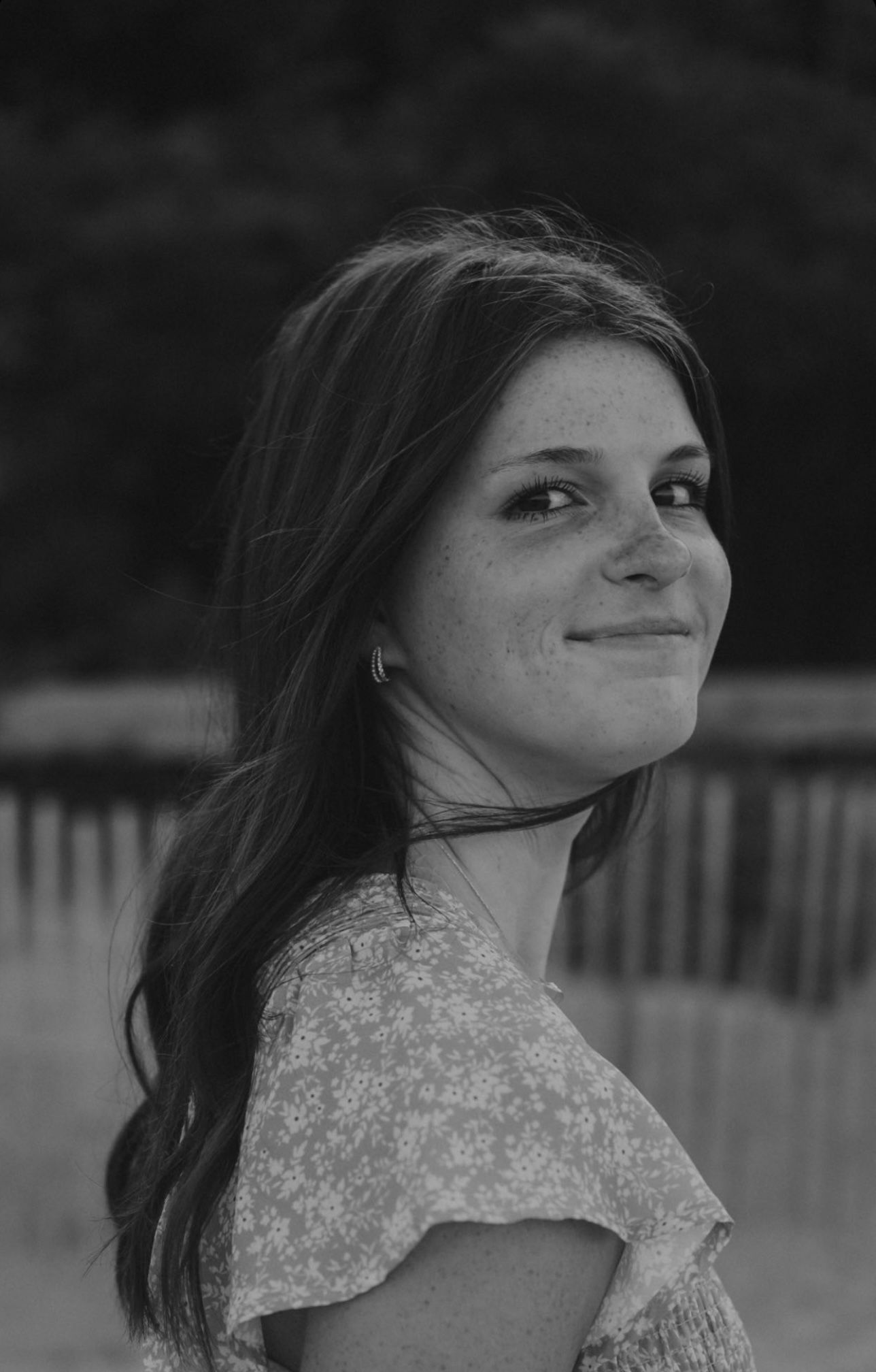 Black and white portraits showing different angles of someone in a lace dress.