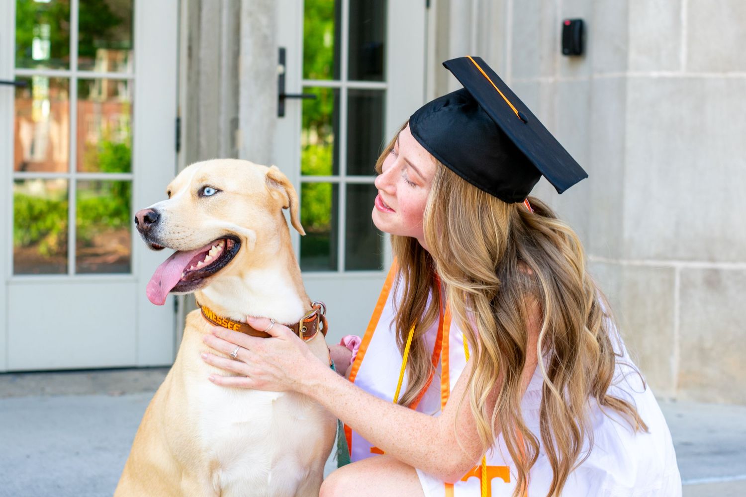 University of Tennessee Knoxville Graduation photo with dog