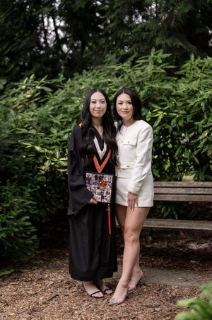 Outdoor graduation portrait session featuring casual and formal poses on park bench surrounded by greenery.
