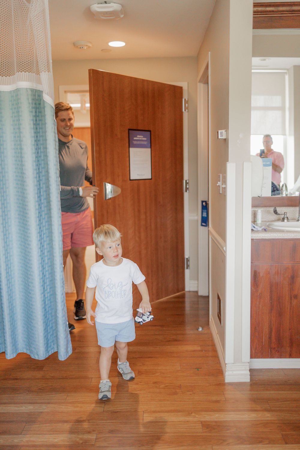 big brother walking into hospital room