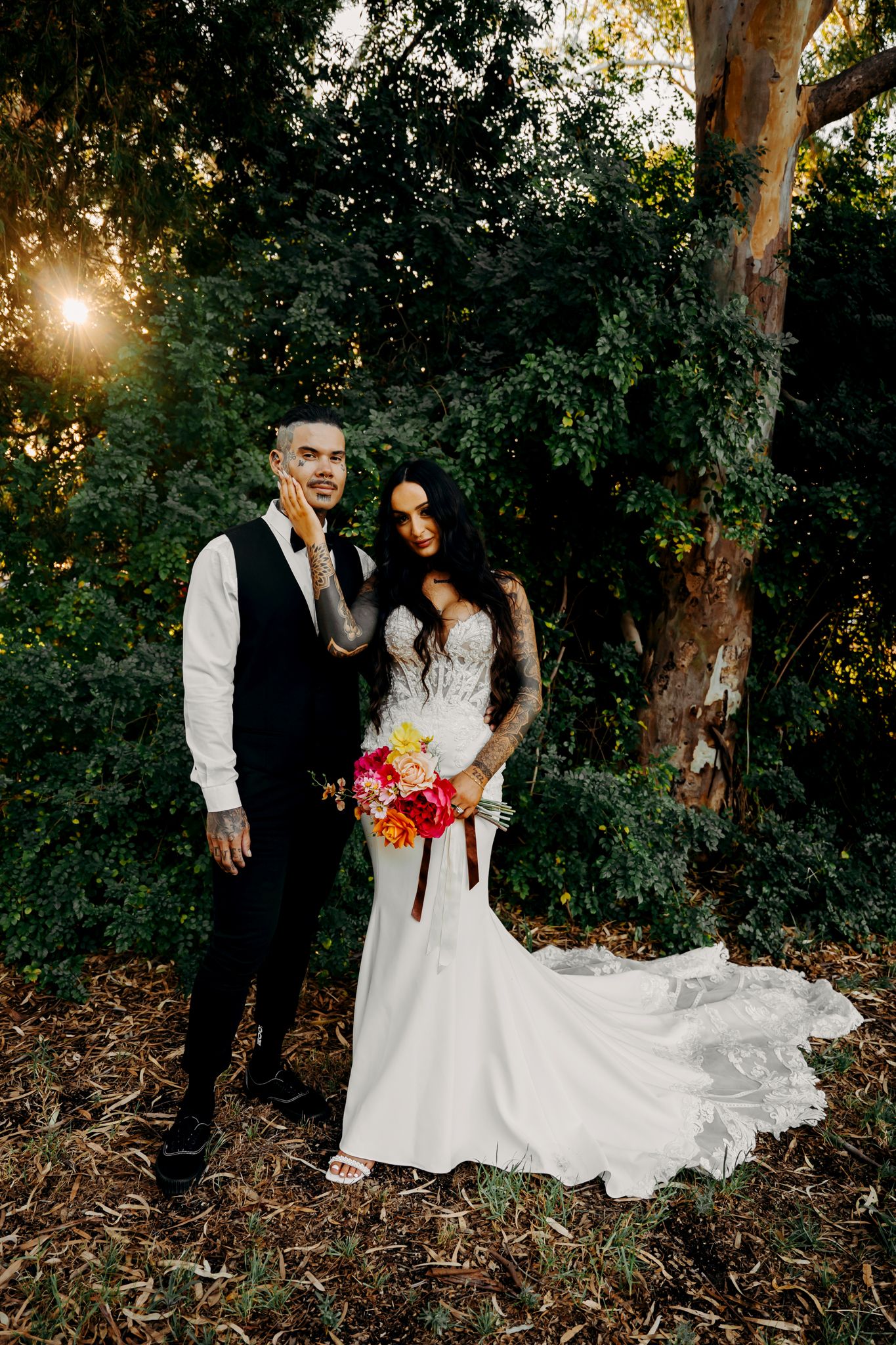 A romantic wedding photo sequence shows the couple embracing under sunlit trees in a wooded outdoor setting.