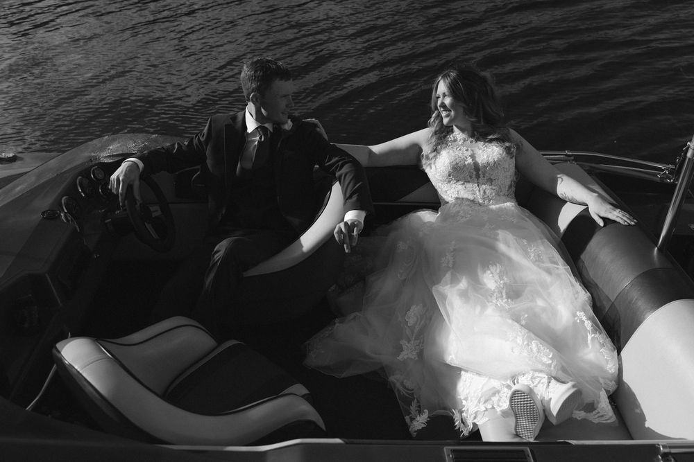 A series of black and white photographs showing various poses and angles of a couple in wedding attire.