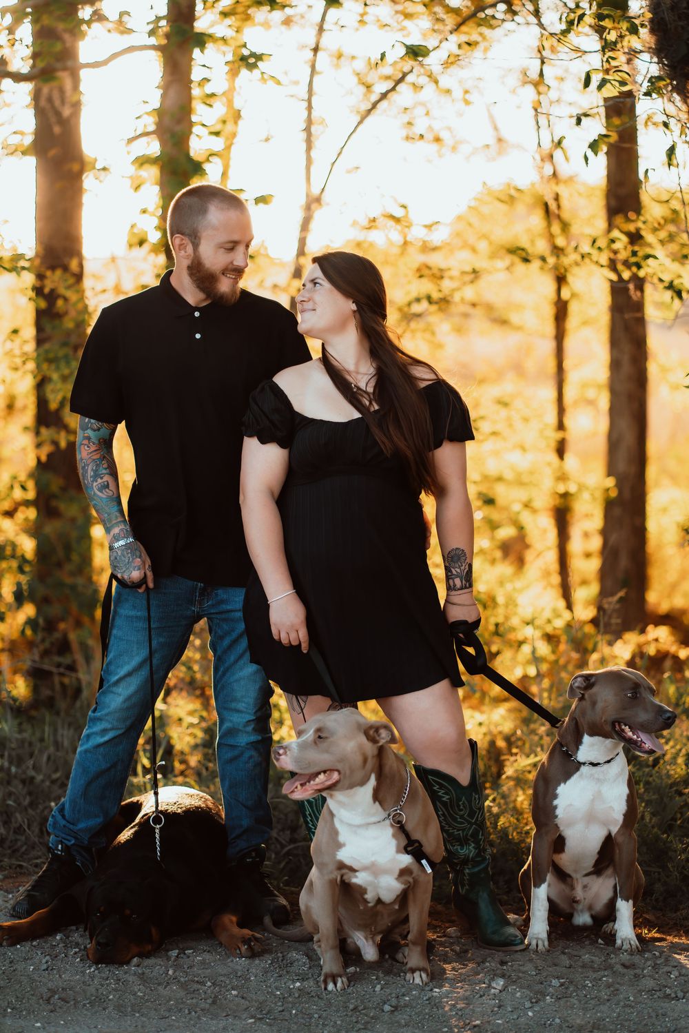 couple engagement with dogs.