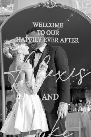Black and white wedding reception photos with decorative welcome signs and celebration text.
