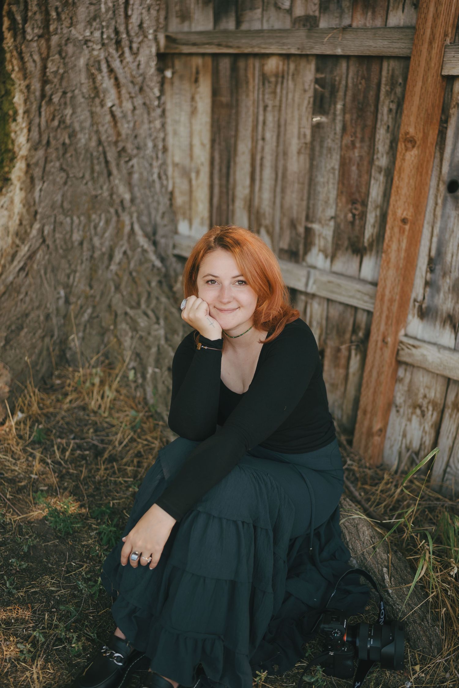 Creative outdoor photography session featuring casual poses against wooden backdrop. Jessicamh Productions