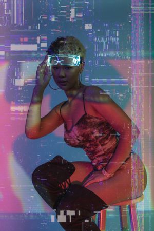 Cyberpunk-style artistic portrait with glowing futuristic eyewear against a glitched neon cityscape background.