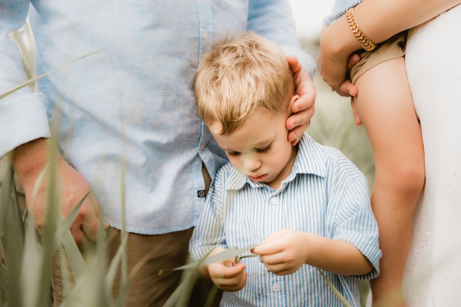 Young boy laughing at the camera during a family portrait shoot in Brisbane northside
