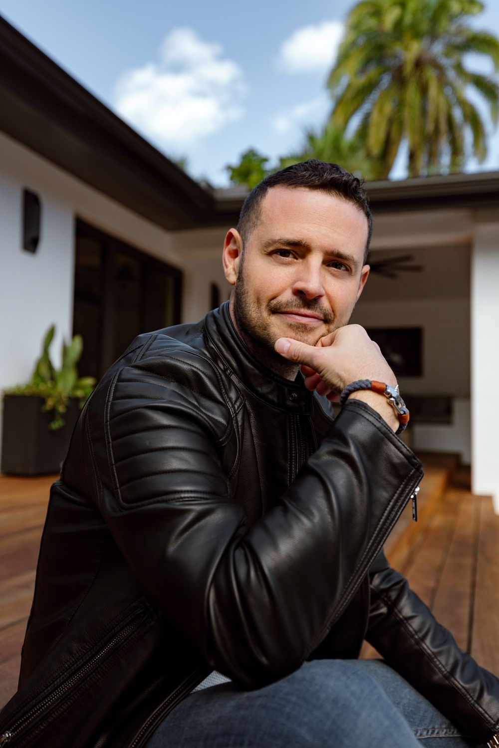 High-end personal branding photography for South Florida executives, featuring a modern lifestyle portrait in a luxury residence.