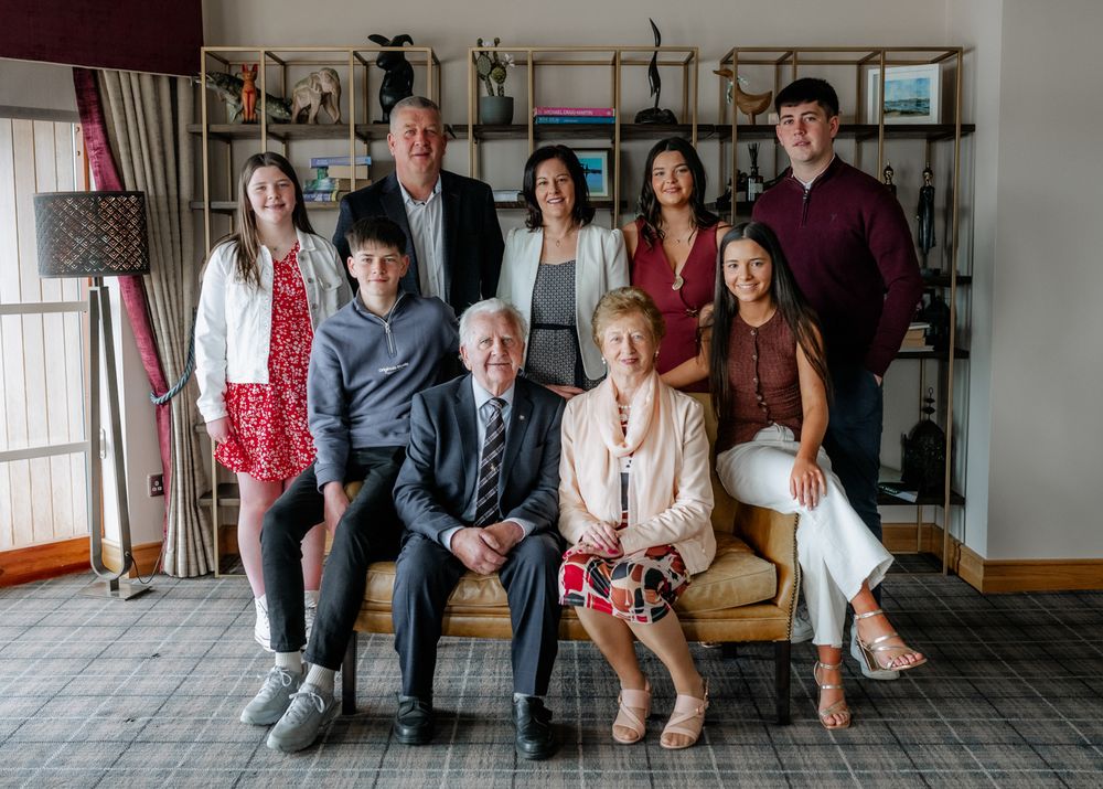 50th anniversary family gathering at Wineport Lodge, elegant portrait with parents, children and grandchildren.