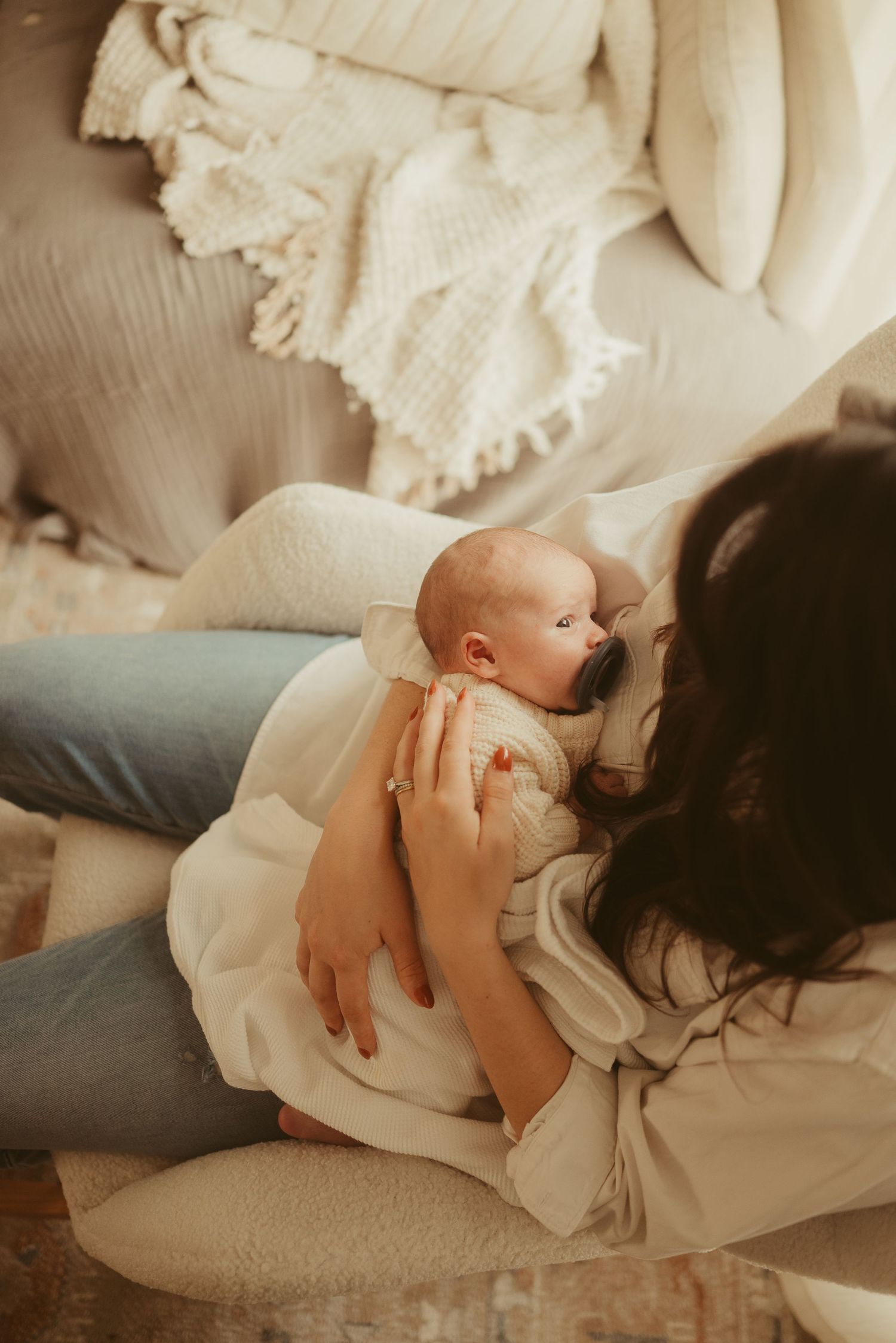 Beautiful image shot from above during lifestyle newborn session in Clarksville, Tennessee by Disney Magic Photography