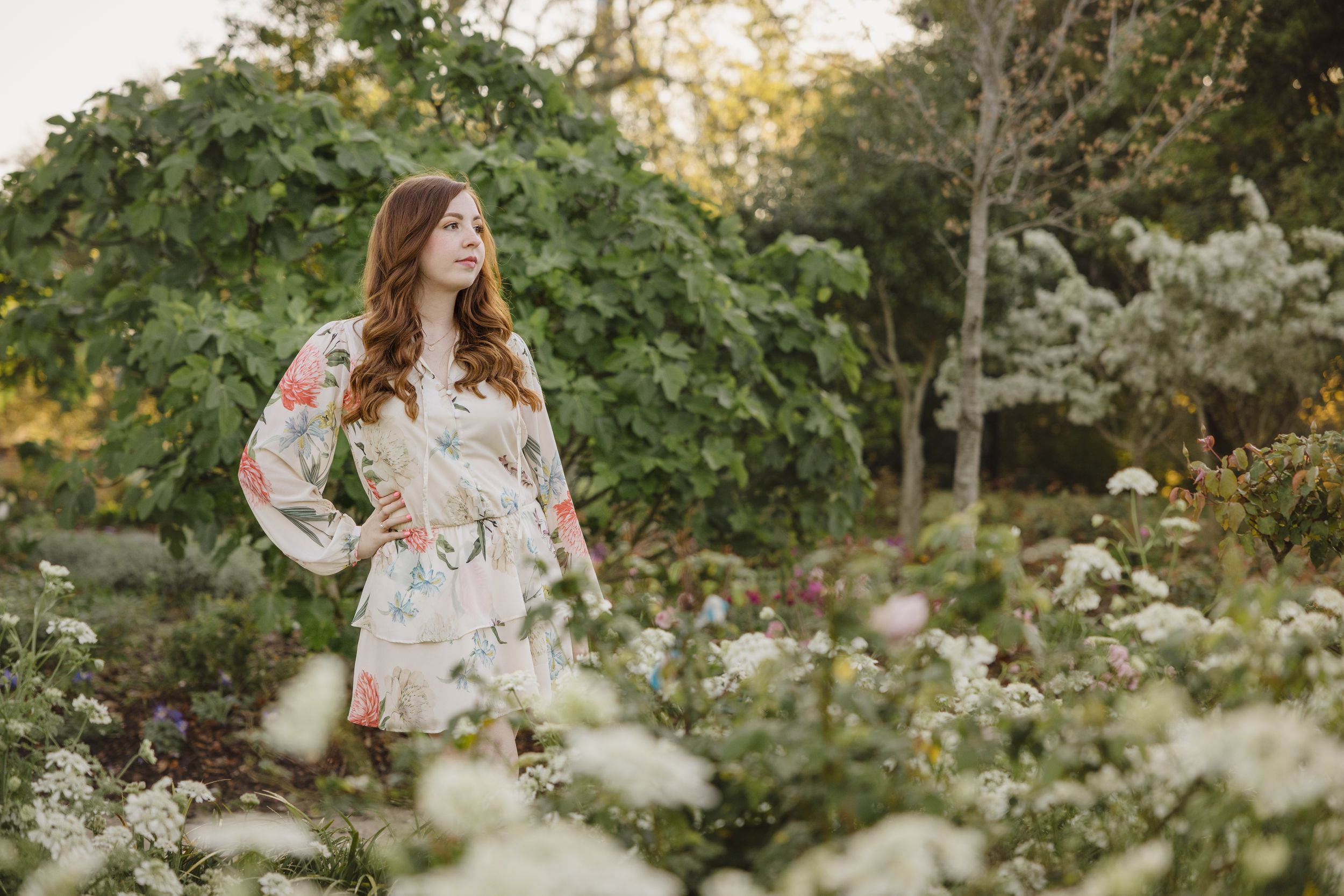 Portrait of woman with beautiful flowers in Hampton Park, Charleston, SC