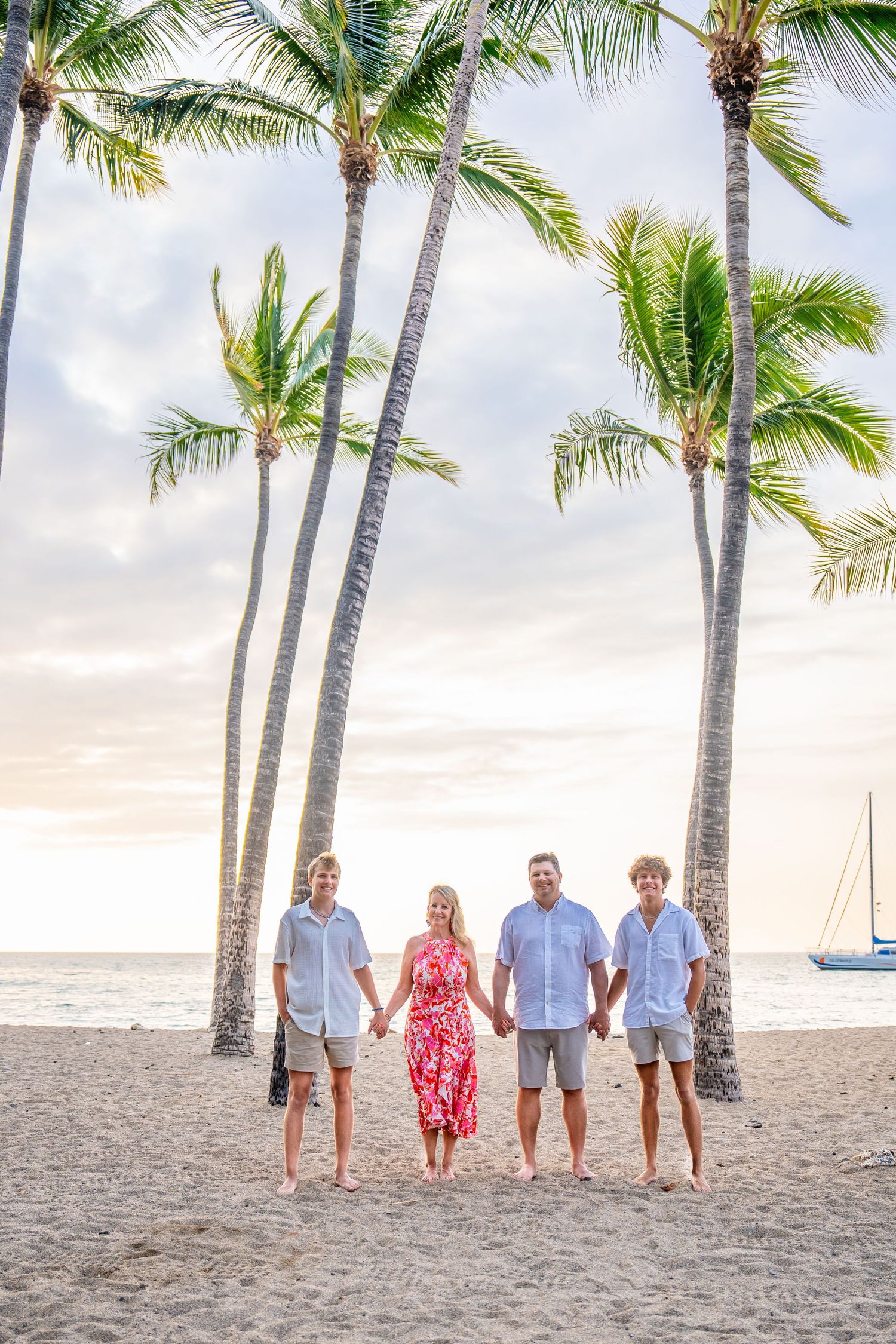 Big Island family beach photographer capturing candid, joy-filled moments on Hawaii’s stunning shores. Sunset sessions. Book your date!