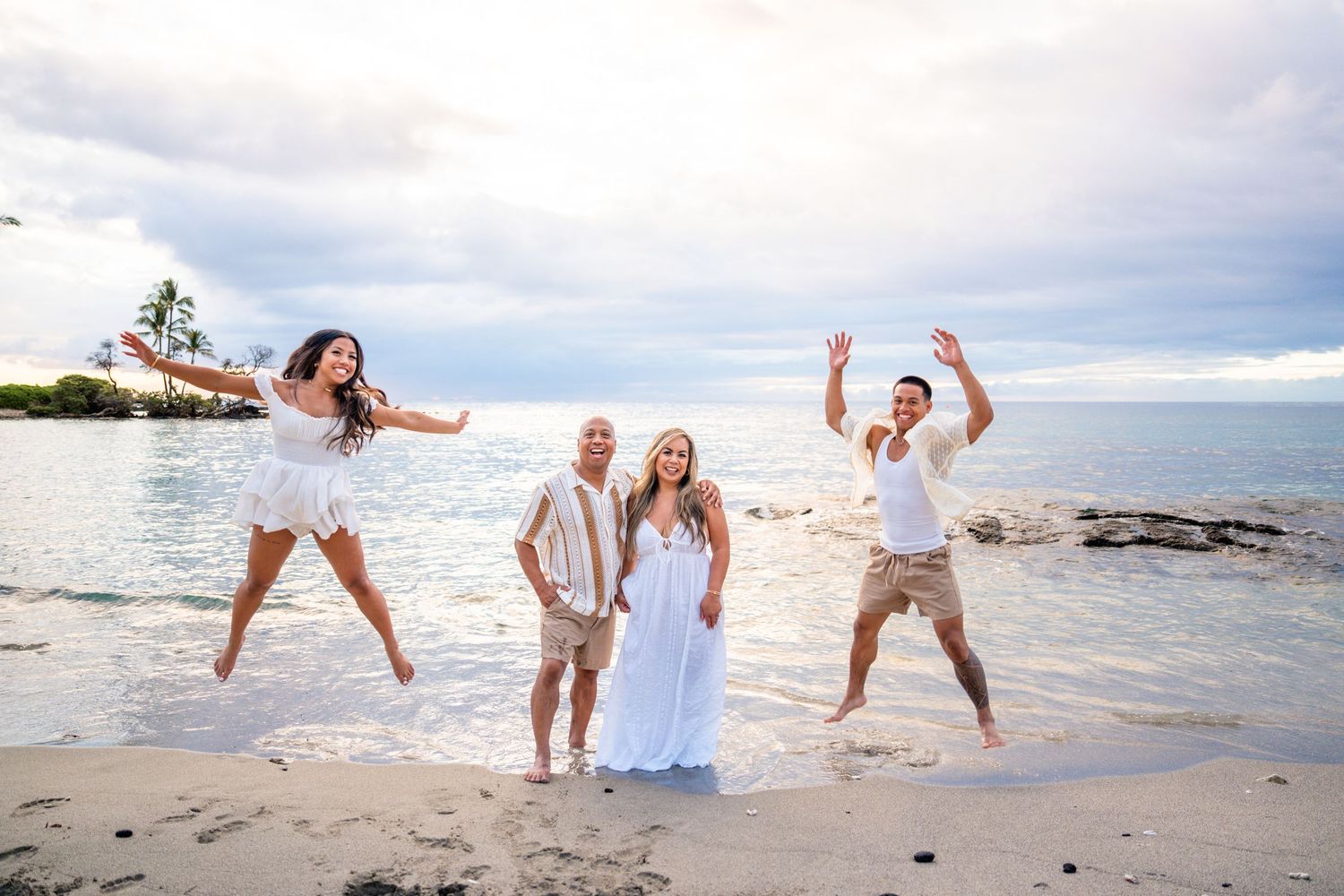 Big Island family beach photographer capturing candid, joy-filled moments on Hawaii’s stunning shores. Sunset sessions. Book your date!