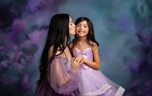 A series of ethereal purple and teal tinted portraits showing someone in a flowing lavender dress against a dreamy backdrop.