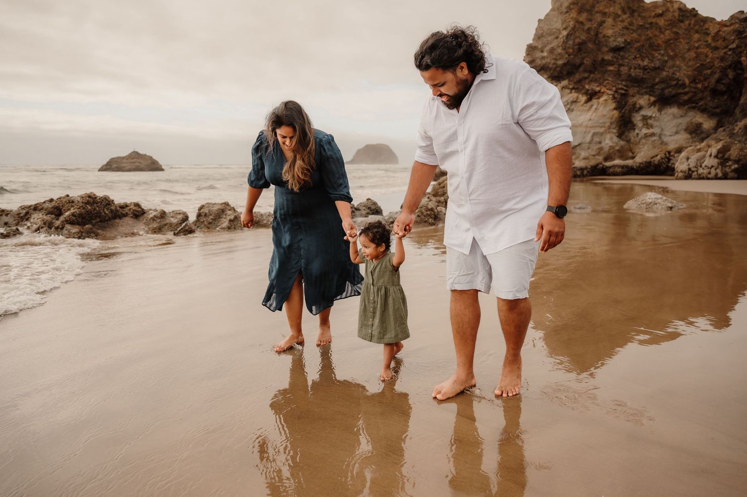 Family walking by a river