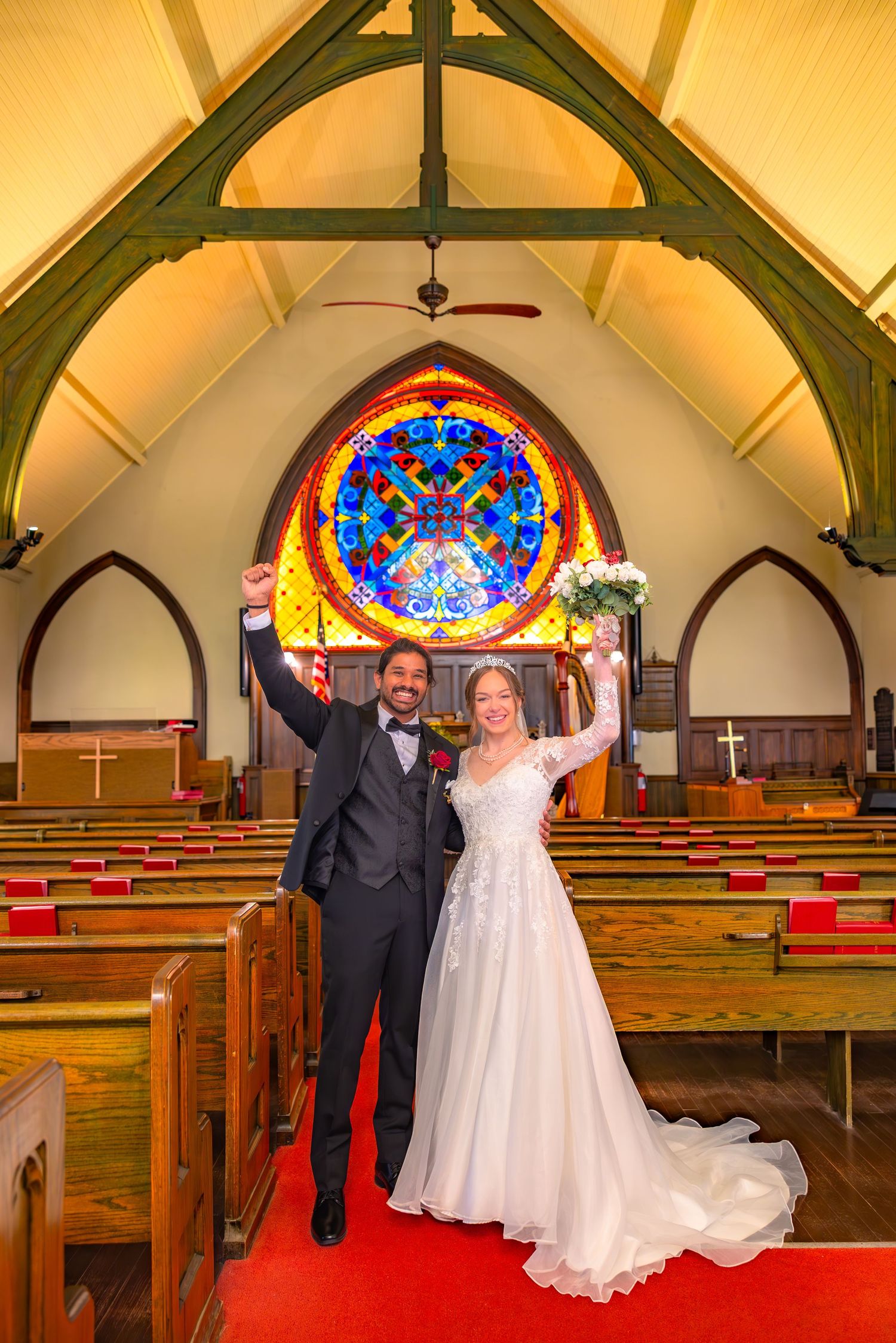 A couple poses in a church sanctuary with stained glass windows and wooden pews, shown in four sequential photos.