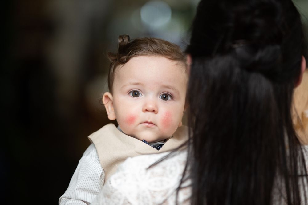 baby boy getting christened