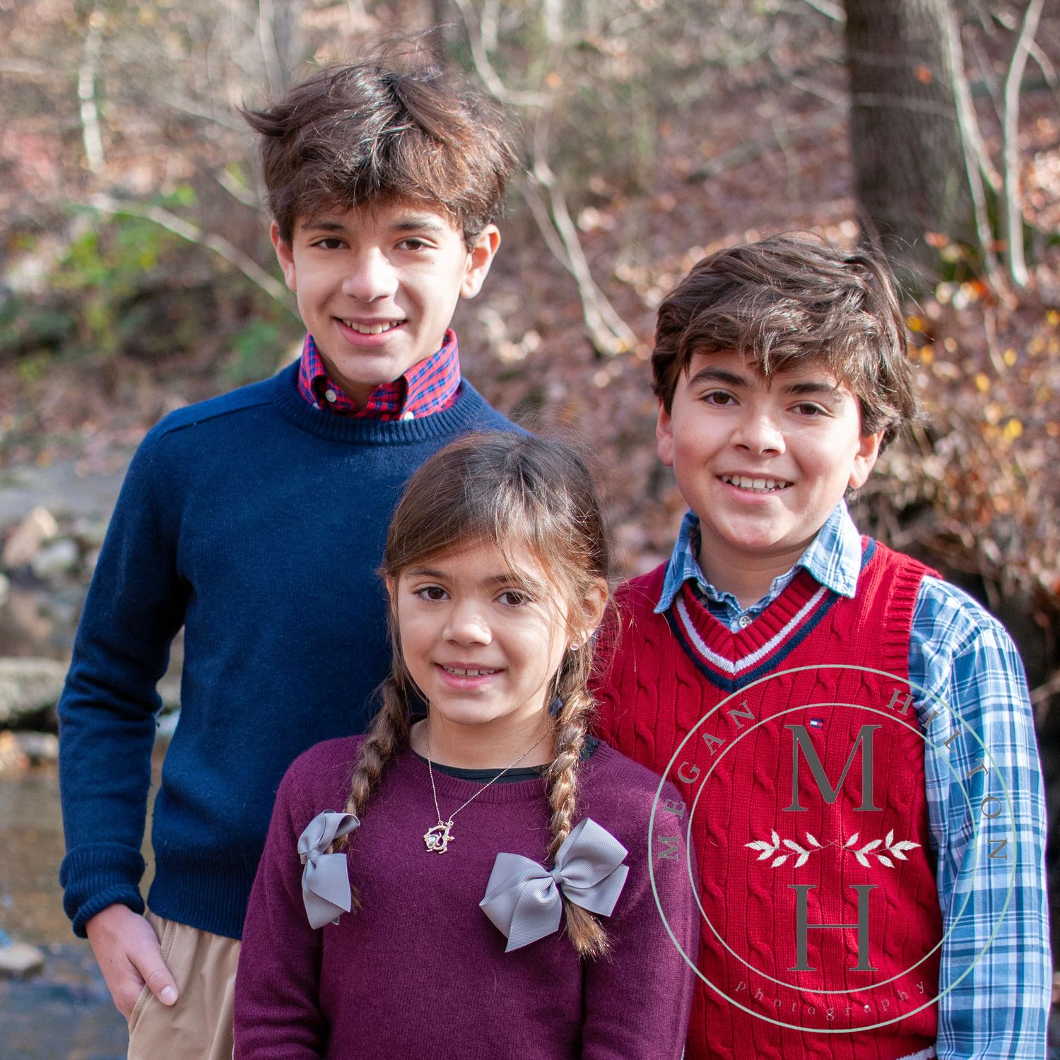 Photo of three kids together close up