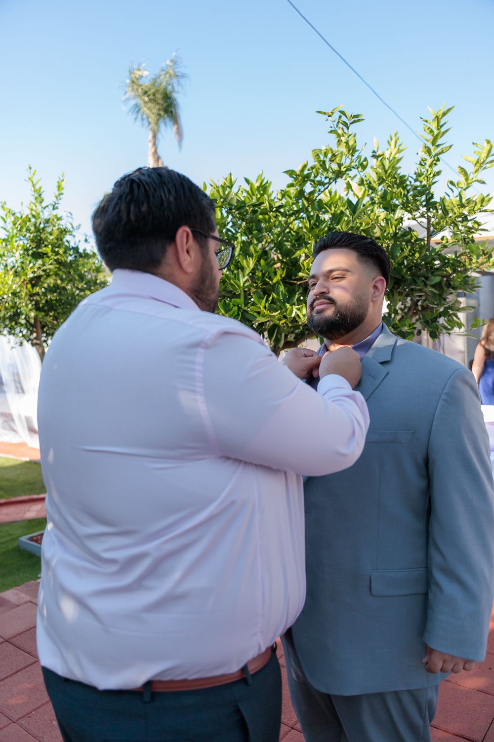Wedding photography of a local couple in Los Angeles County. Getting ready photographed in color.