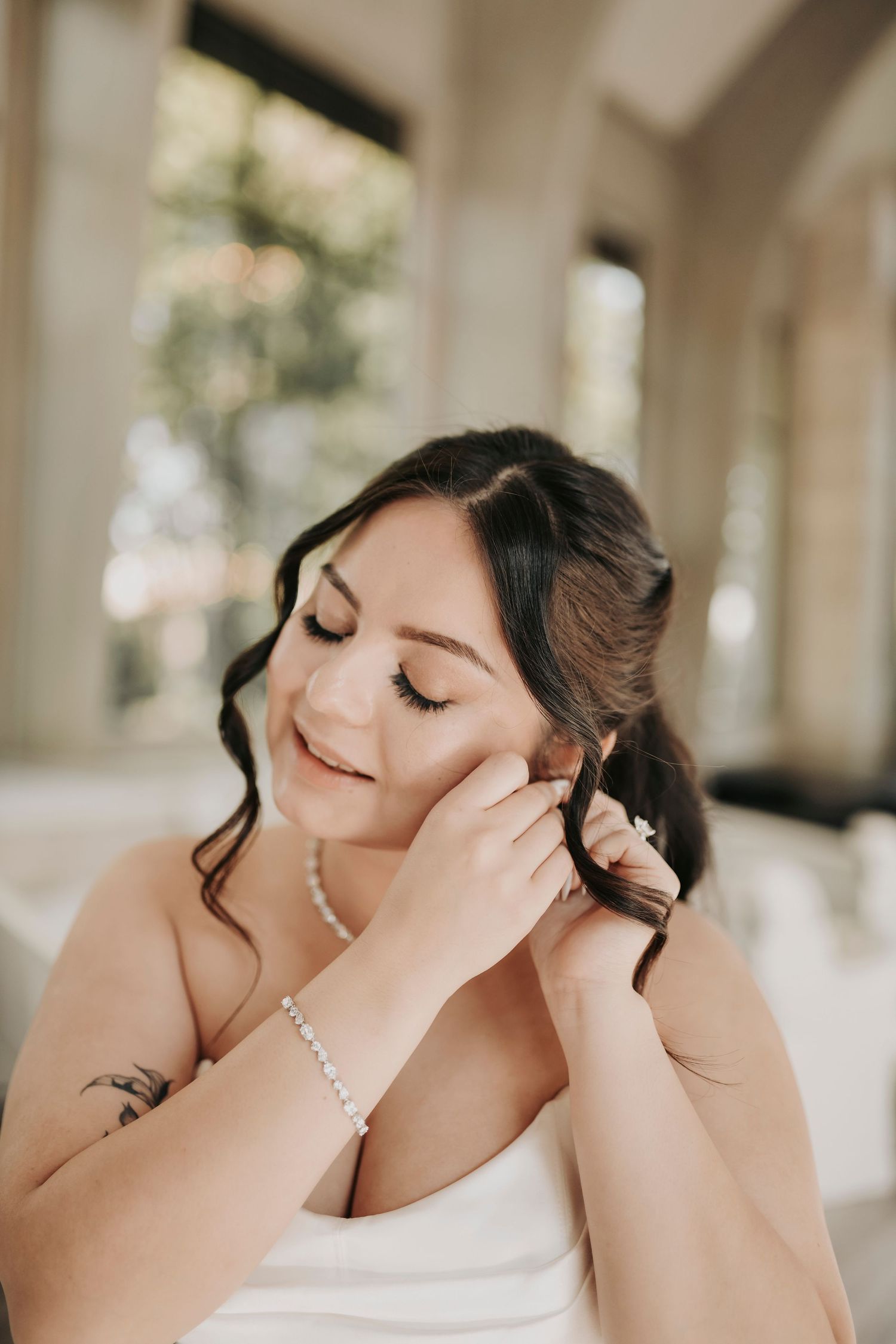 Bride preparing to walk down the aisle at Brighton Abbey
