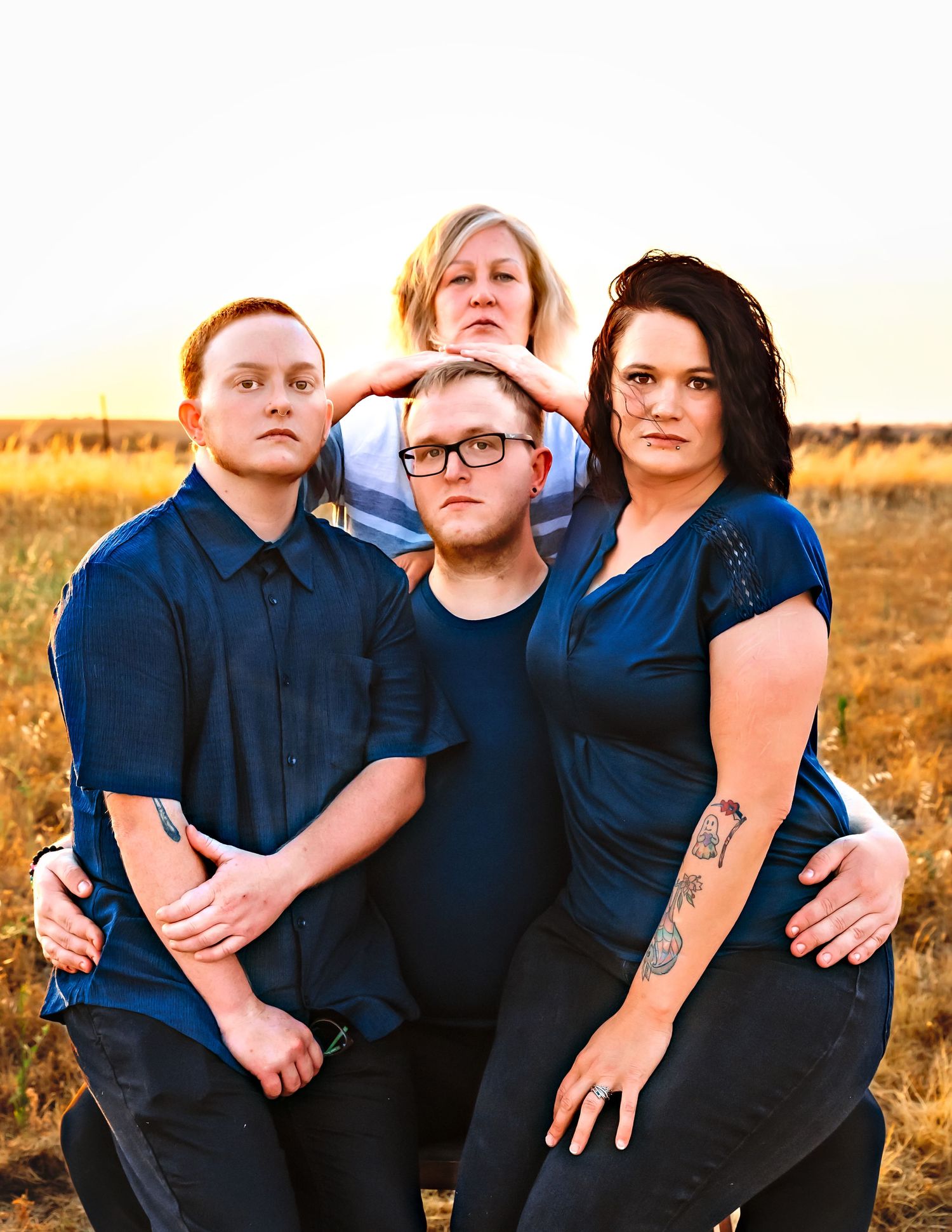 Family photographer Fresno Clovis area Colibri Captures portrait session with parents and grown adults dark humor/akward
