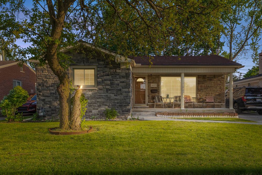 Stone facade ranch home with covered porch on Midway Street Dearborn Michigan