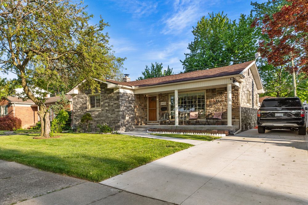 Stone facade ranch home with covered porch on Midway Street Dearborn Michigan