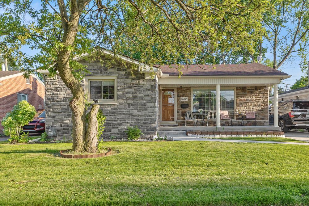 Stone facade ranch home with covered porch on Midway Street Dearborn Michigan