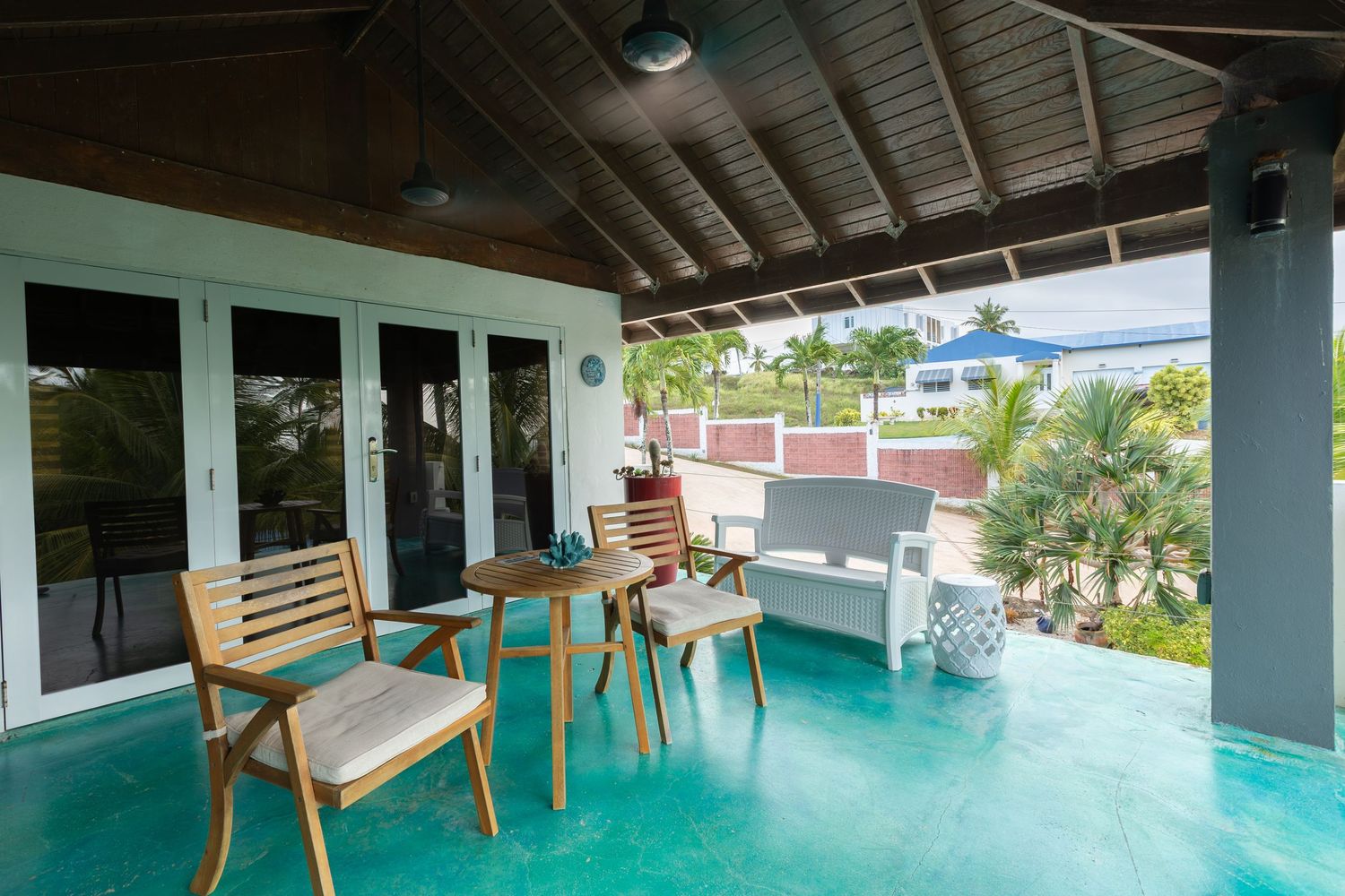 Outdoor covered seating area. Beach house in Vega Baja, Puerto Rico.