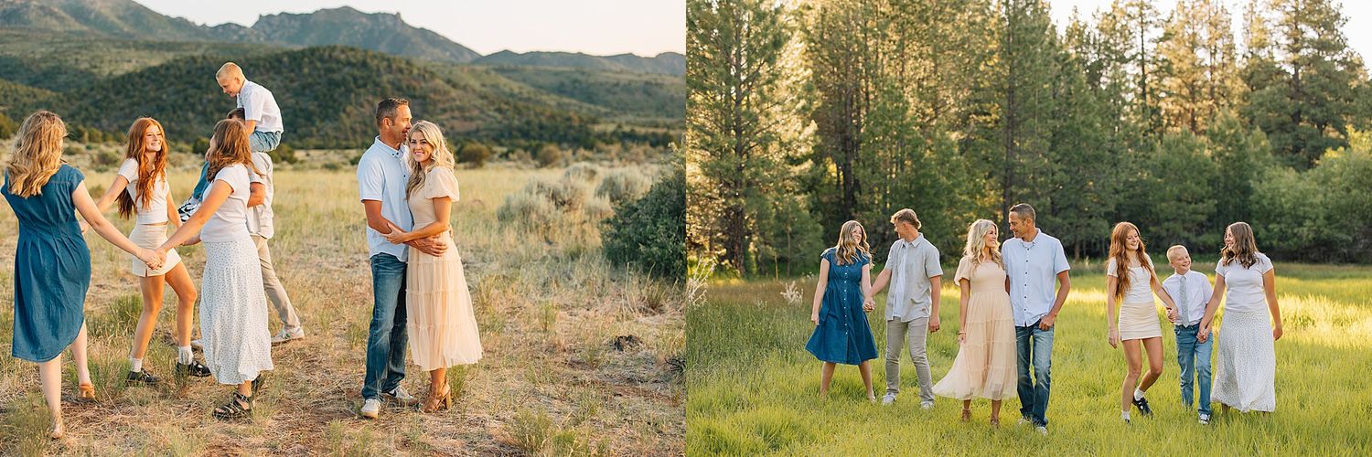 A joyful family poses together in a sunny mountain meadow, wearing casual summer outfits amid green grass and pine trees.
