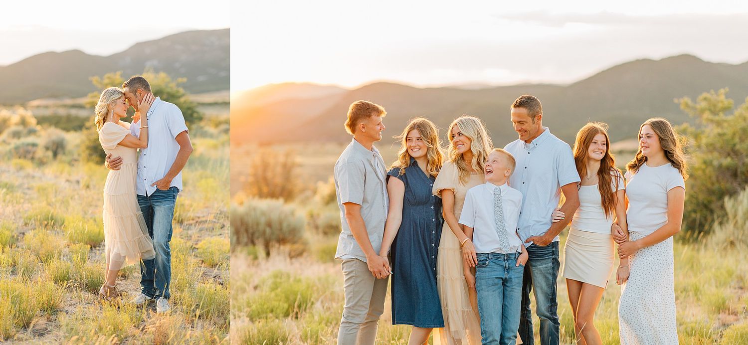 Family posing together at sunset in a scenic desert field with mountains in the background.