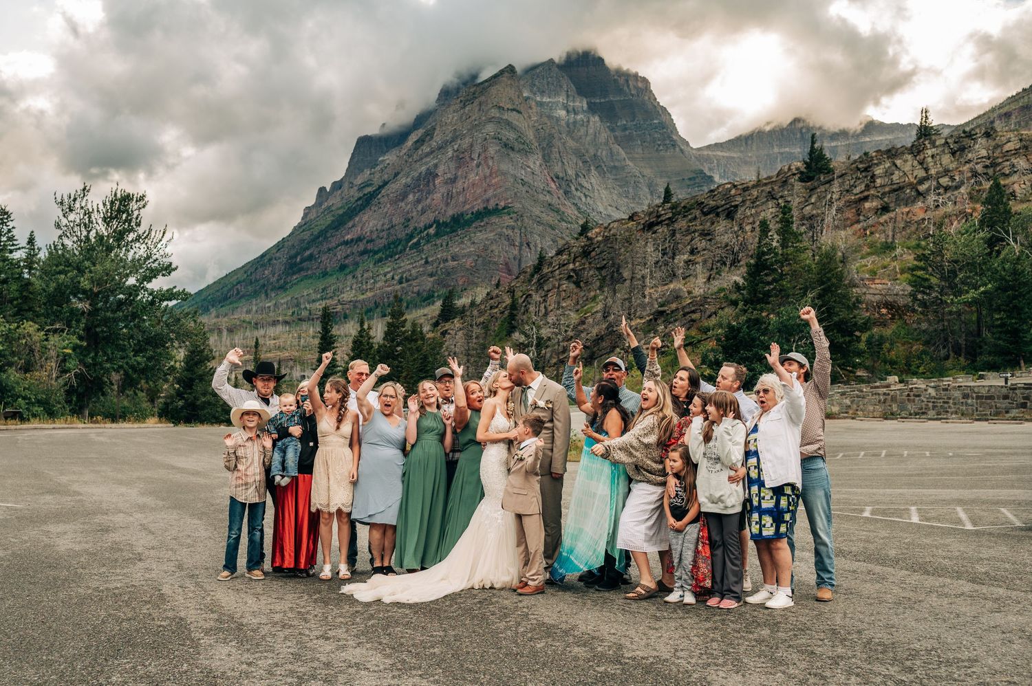 A panoramic sequence of wedding party photos taken against dramatic mountain landscapes in cloudy weather.