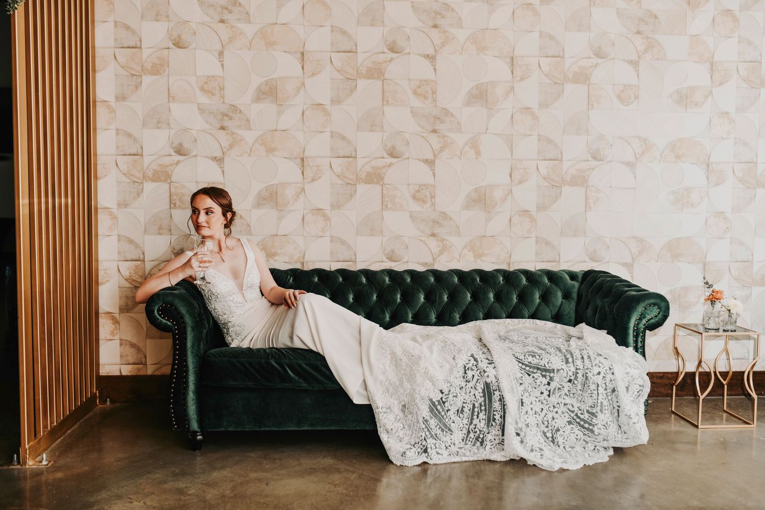 Elegant bridal portrait of a Dallas bride standing in natural light showcasing her wedding gown and veil before the ceremony.