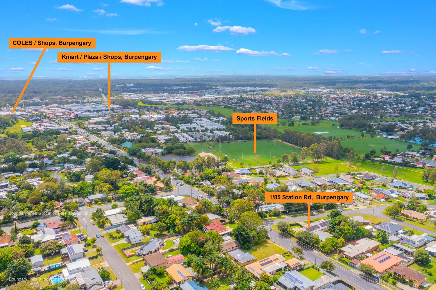 Aerial view of a Burpengary suburb highlighting nearby amenities including Coles shops and sports fields.