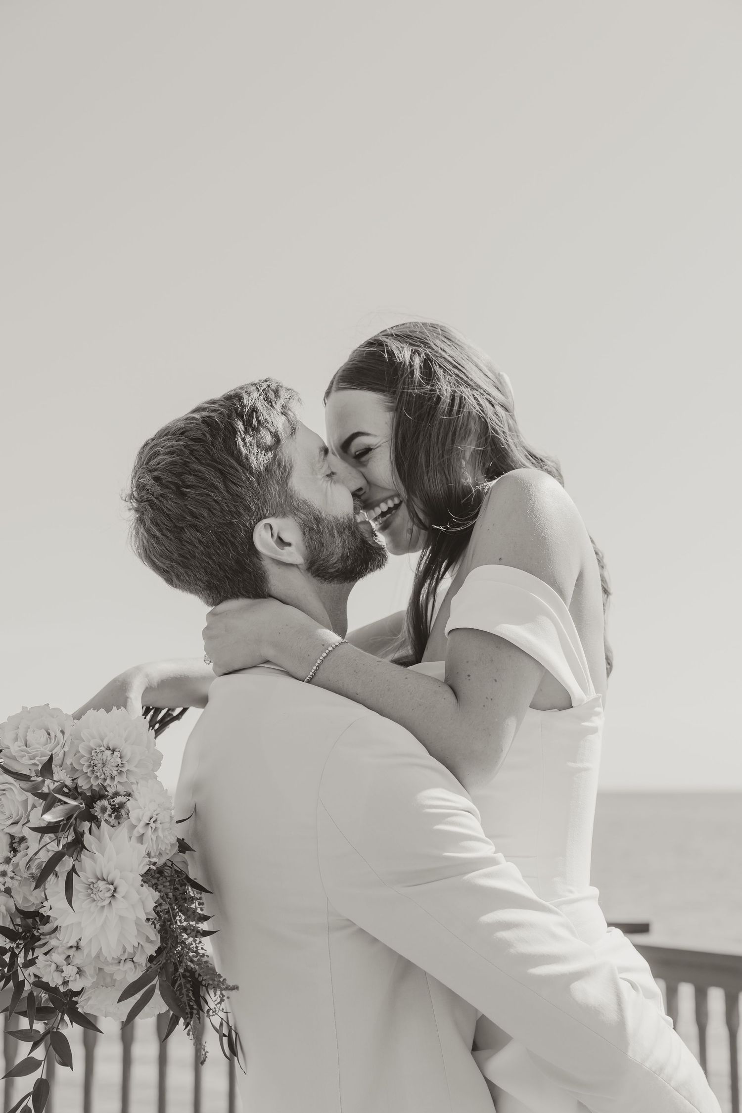 Quiet ceremony moment captured with intention and natural light at an elegant Michigan wedding.