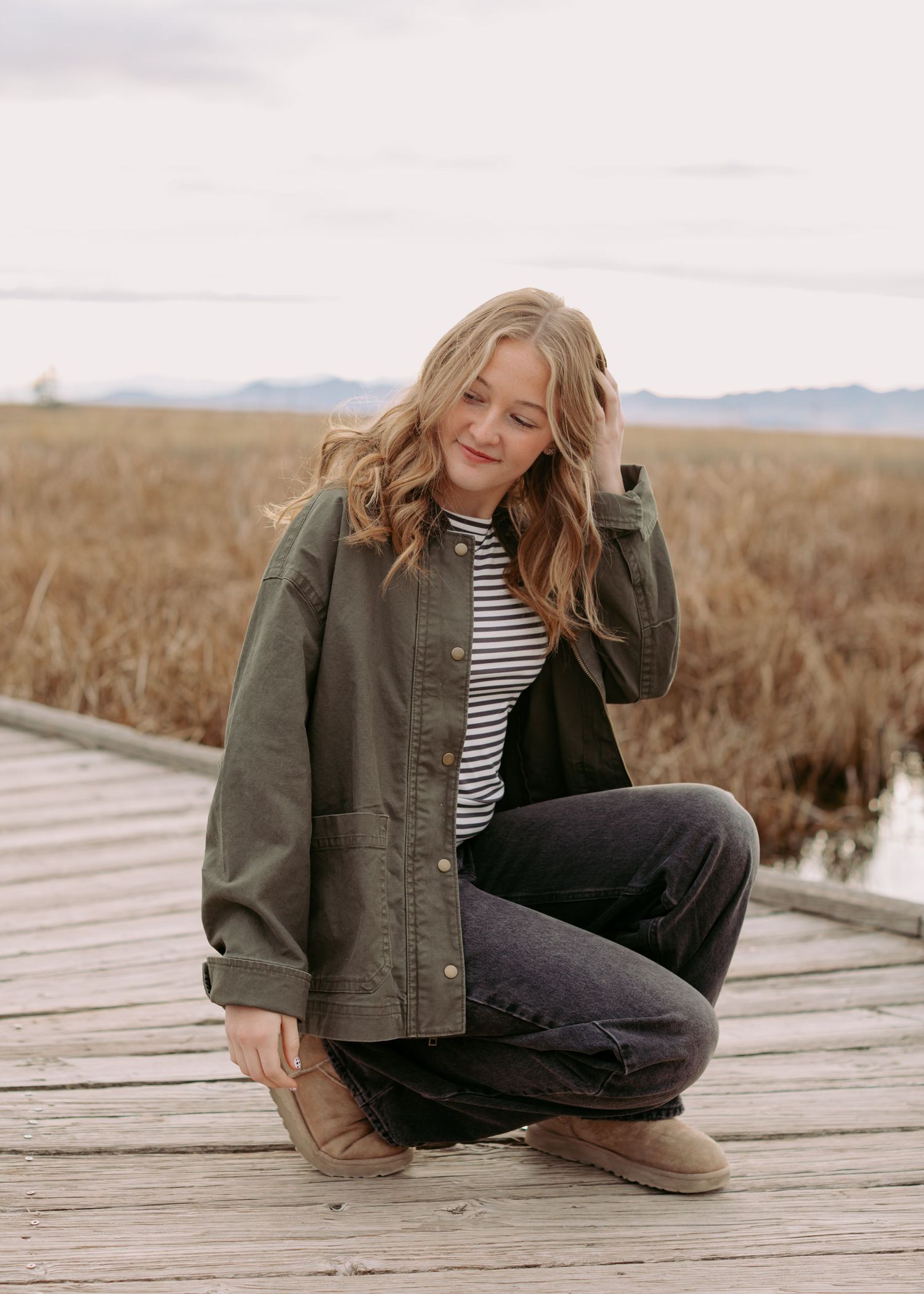 Senior photo session in Utah in a fun field.