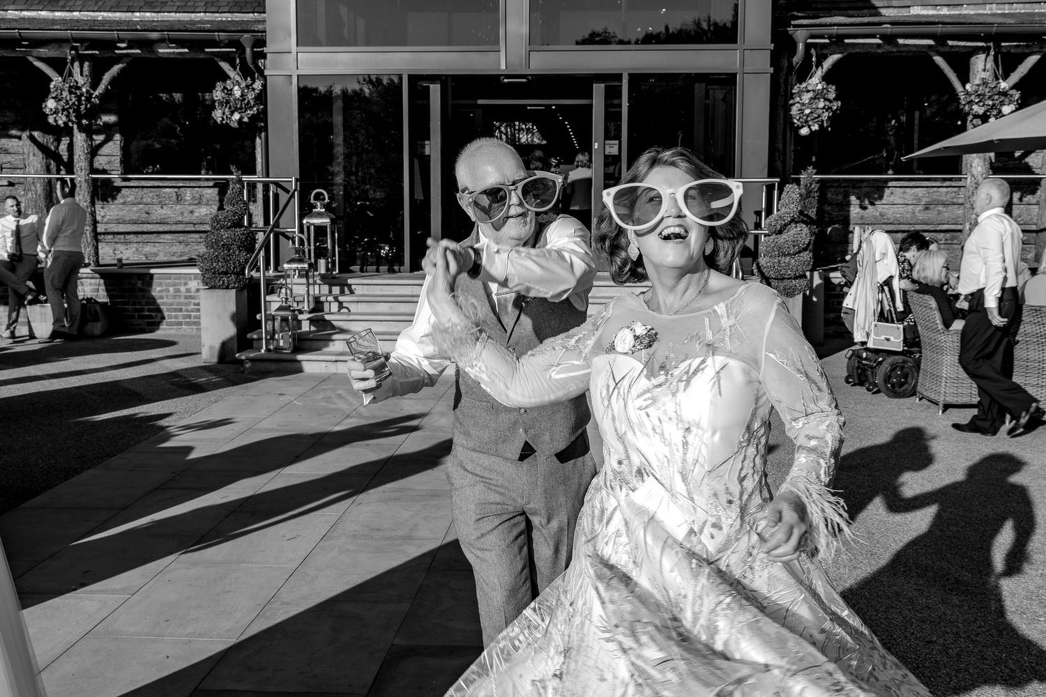 Documentary wedding photography capturing natural moments between guests.
