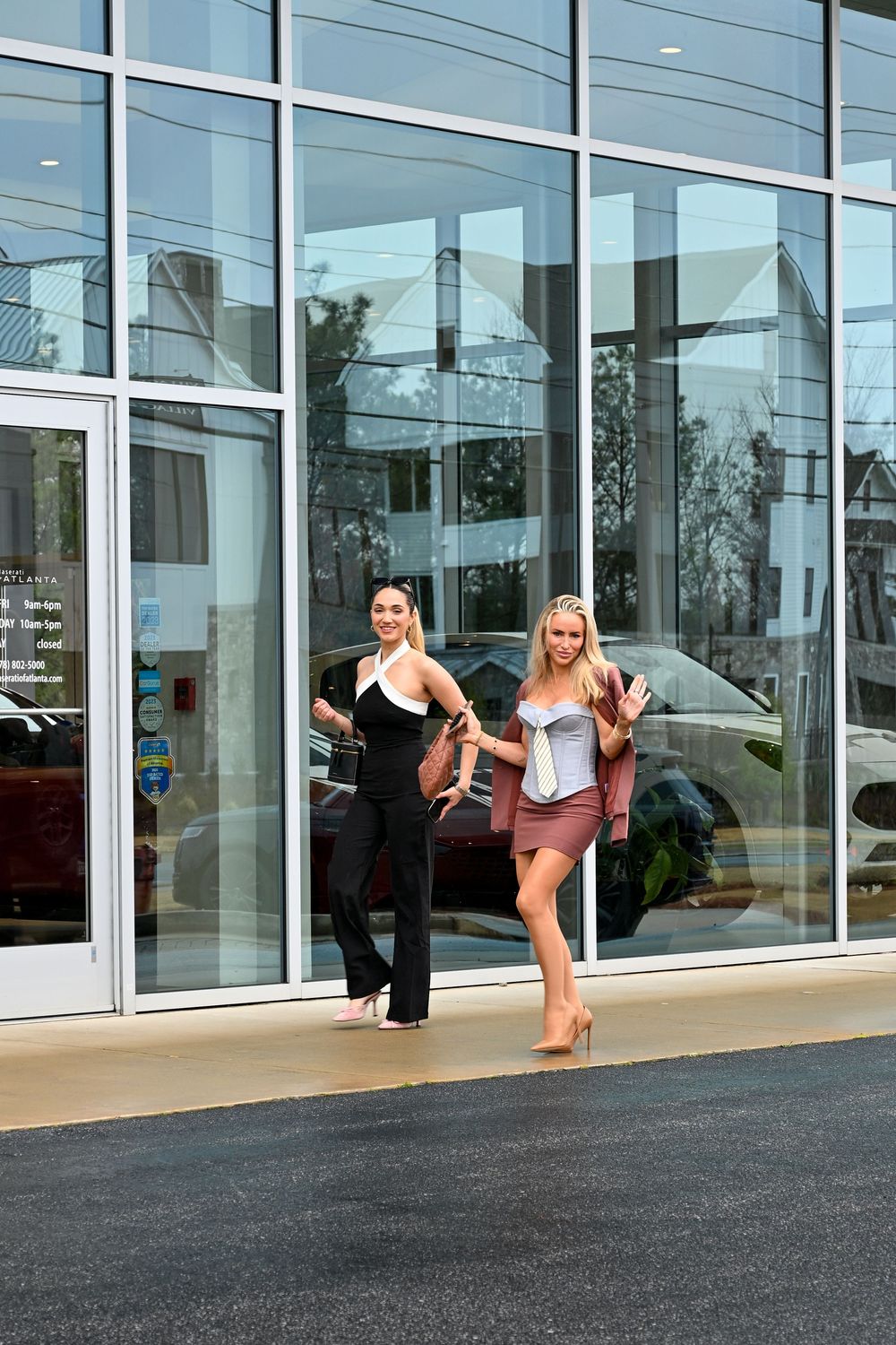A sequence of dance poses captured in front of a modern glass building exterior.