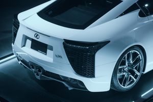 Side profile views of a sleek white Lexus LFA supercar showcasing its aerodynamic design and sporty alloy wheels.