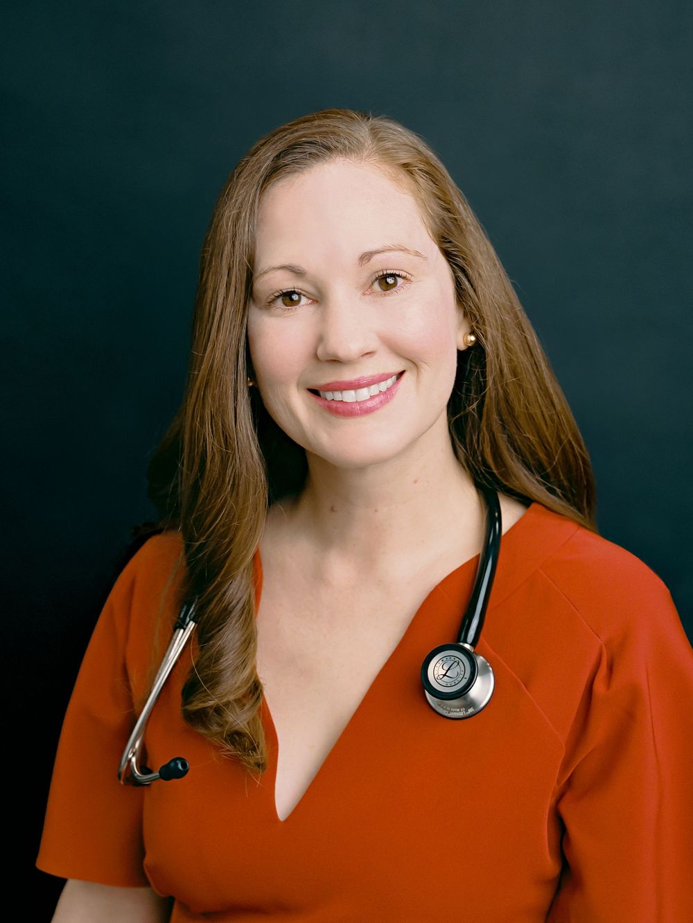 Professional headshots against a dark background show a medical professional in red scrubs wearing a stethoscope.