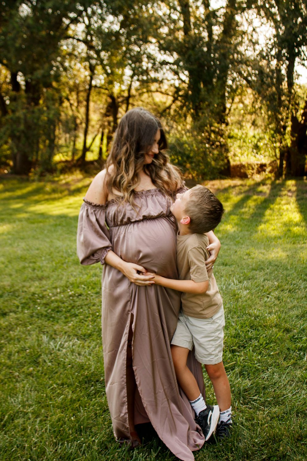 A mother and son during a maternity photo session at The League House in Amarillo, Texas