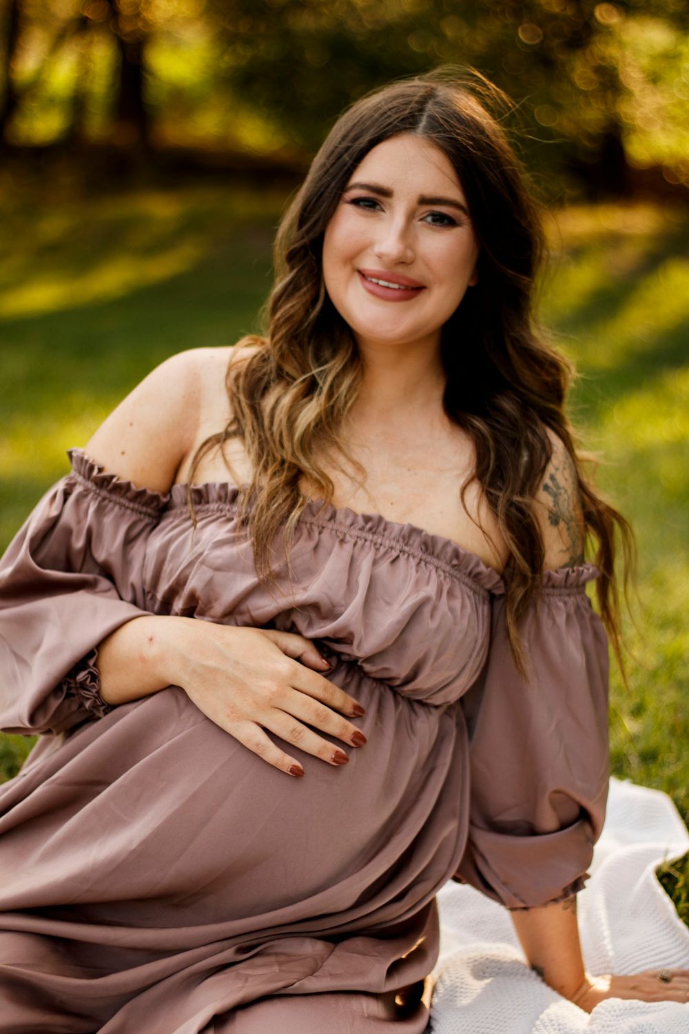 An expecting mother during a maternity photo session at The League House in Amarillo, Texas