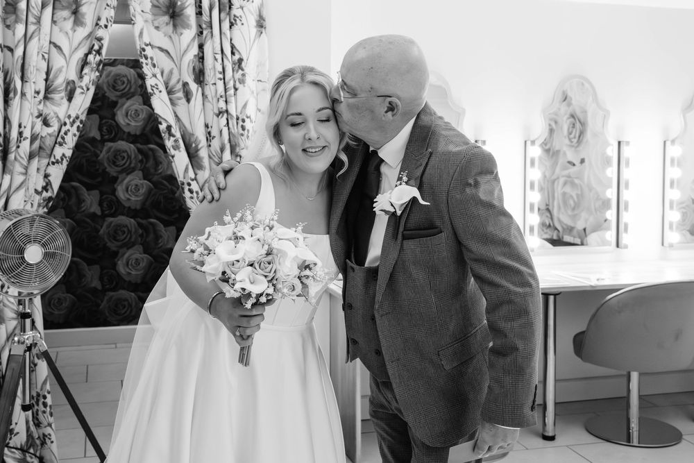 Kingscote Barn Wedding Photographer Zara Davis Photography Cotswolds Gloucestershire Cheltenham bride and dad in bridal suite