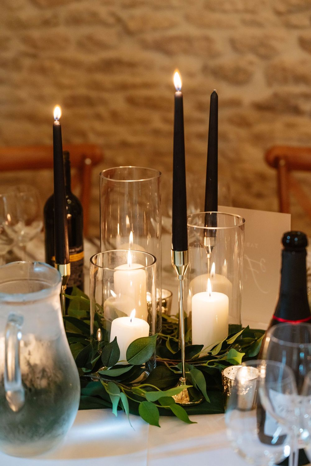 Kingscote Barn Wedding Photographer Zara Davis Photography Cotswolds Gloucestershire Cheltenham close up candles on tables