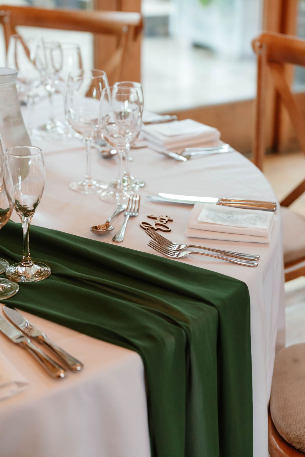 Kingscote Barn Wedding Photographer Zara Davis Photography Cotswolds Gloucestershire Cheltenham close up of table decor emerald green white
