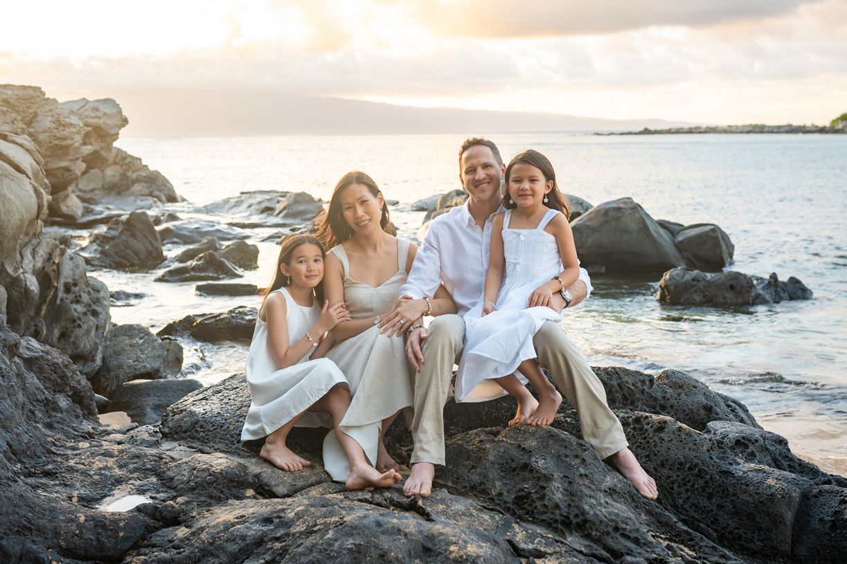 Maui family photographer photo against beautiful Maui sunset beach by ohwowfotos.